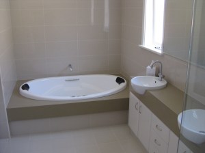 Ensuite bathroom,inset bath on stone