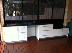 outdoor kitchen,bbq. black granite tops