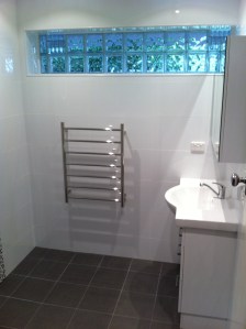 renovation. glassblock window installed & 10mm shower panel